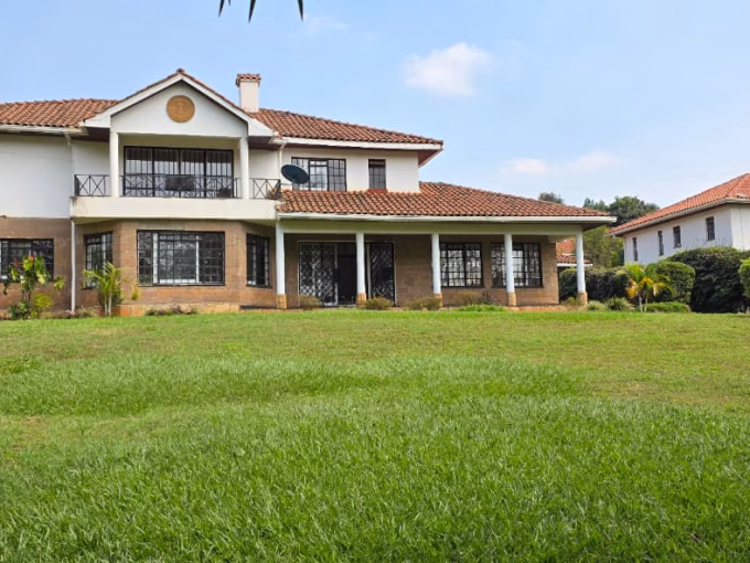 This exquisite 5-bedroom townhouse